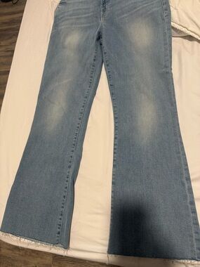 Frame Denim Light Wash Flare Jeans with Raw Hem